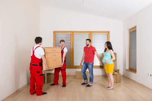 Careful furniture removal from a flat with stairs and narrow access in Holland Park