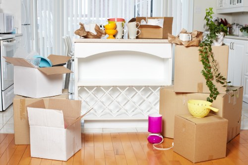 Professional movers managing access and parking challenges in Holland Park