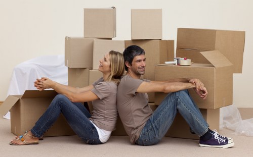 Professional movers coordinating a local office relocation
