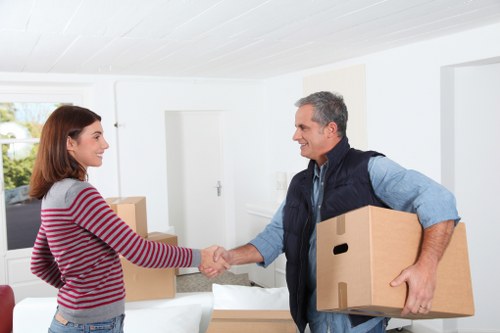 Furniture and boxes prepared for urgent removals in a local flat