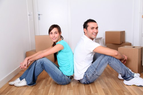 Careful loading of household items for a local Holland Park move