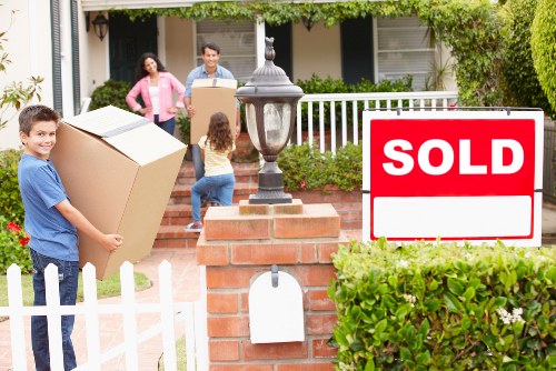Local van service handling boxes and household items for a move in Holland Park