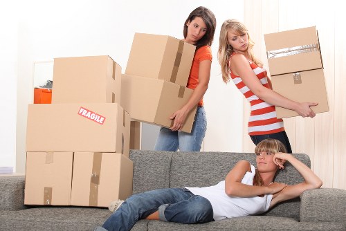 Careful loading of student furniture and boxes for a local move